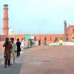 Visitors are exploring the historic Badshahi Mosque