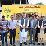 Deputy Commissioner Abdullah Nair Sheikh cutting ribbon to inaugurate the 15-day special cleaning campaign at Saeemi Chowk, Satyana Road.