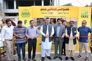 Deputy Commissioner Abdullah Nair Sheikh cutting ribbon to inaugurate the 15-day special cleaning campaign at Saeemi Chowk, Satyana Road.