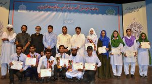 Assistant Director Sargodha Arts Council Muhammad Khan Hargan in a group photograph with position holder students during speech competition title “Hai Rah-e-Haq Ke Shaheedo” in connection with Defense Day of Pakistan organized by Sargodha Arts Council. 
