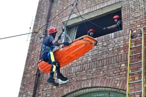 A group photo of Regional Emergency Officer Dr. Fawad Shahzad Mirza and District Emergency Officer Rescue 1122 Dr. Syed Mazhar Shah with District Bhakkar team during Inter Division Rescue Challenge at Rescue 1122 office, Aziz Bhatti Town.