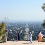 People having view of Federal Capital through famous picnic point Damn-e-Koh.