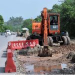 Heavy machinery being used for expansion work of Club Road during development work in the Federal Capital