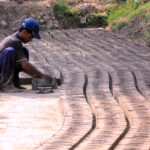 Labourers busy in making bricks at a local brick kiln
