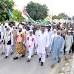 A large number of people participating in a rally to mark Eid-e-Milad-un-Nabi (PBUH) at I-9 sector in the federal capital
