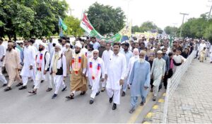 A large number of people participating in a rally to mark Eid-e-Milad-un-Nabi (PBUH) at I-9 sector in the federal capital