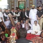 Sindh Caretaker Minister for Culture and Tourism Syed Dr. Junaid Shah and Sindh Caretaker Minister for Religious Affairs Muhammad Umar Soomro are enjoying the performance of folk artist who is singing a traditional song at the shrine of Shah Abdul Latif Bhitai on the occasion of 280th Urs celebration