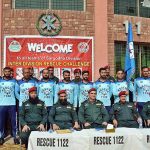 A group photo of Regional Emergency Officer Dr. Fawad Shahzad Mirza and District Emergency Officer Rescue 1122 Dr. Syed Mazhar Shah with District Bhakkar team during Inter Division Rescue Challenge at Rescue 1122 office, Aziz Bhatti Town.