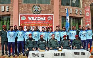 A group photo of Regional Emergency Officer Dr. Fawad Shahzad Mirza and District Emergency Officer Rescue 1122 Dr. Syed Mazhar Shah with District Bhakkar team during Inter Division Rescue Challenge at Rescue 1122 office, Aziz Bhatti Town.