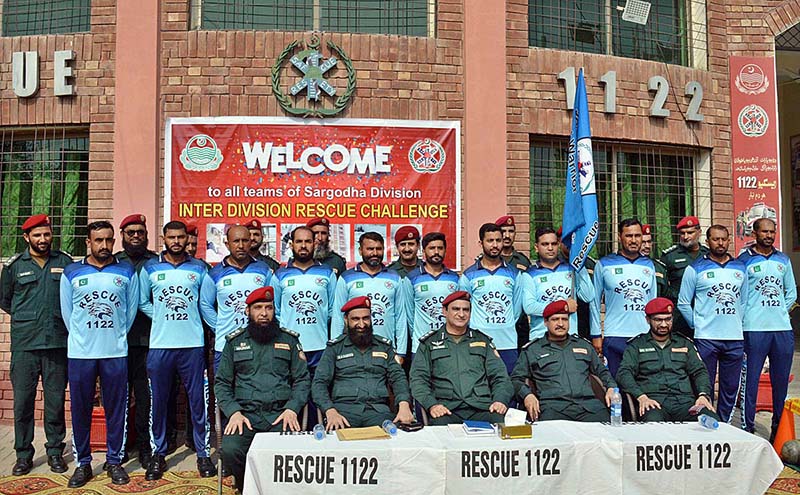 A group photo of Regional Emergency Officer Dr. Fawad Shahzad Mirza and District Emergency Officer Rescue 1122 Dr. Syed Mazhar Shah with District Bhakkar team during Inter Division Rescue Challenge at Rescue 1122 office, Aziz Bhatti Town.