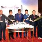 Commerce Minister Dr. Gohar Ejaz and Malaysian Ambassador to Pakistan H.E., Azhar Mazlan cutting the cake at the celebration of 66th National Day and 90th Armed Force Day of Malaysia.