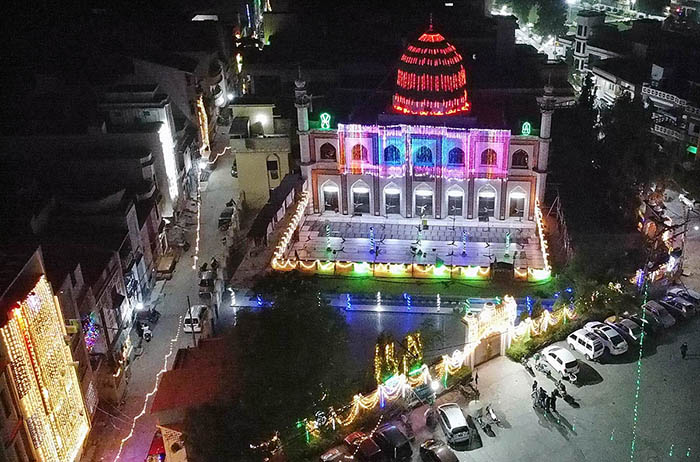 An illuminated view of Mosque decorated with colorful lights in connection with Eid Milad-un-Nabi (PBUH).