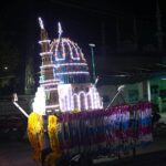 A tri-wheeler on away decorated with model in connection with Eid Milad-un-Nabi (PBUH) at Jhang Morr.