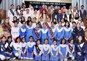 Federal Minister for Education Madad Ali Sindhi, Principal Prof Sabah Faisal poses for a group photo with participants of Project Exhibition titled " Beyond the Classroom" held at Islamabad College for Girls ICG F6-2.