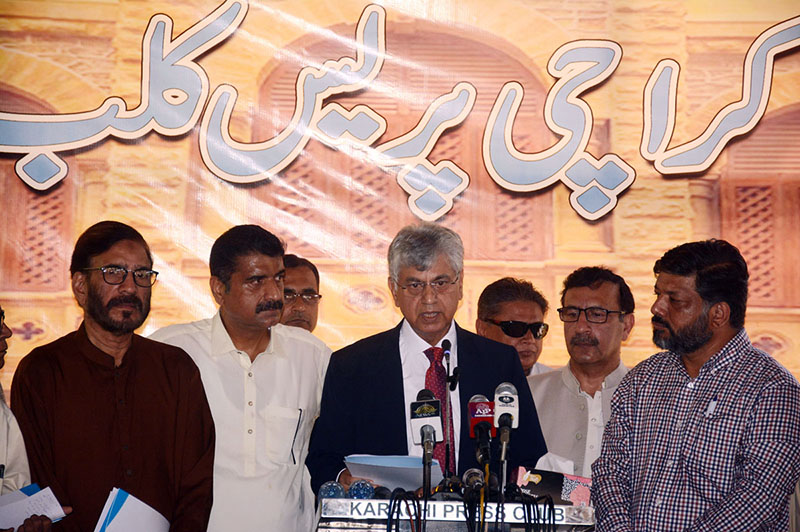 Caretaker Federal Minister for Information and Broadcasting Murtaza Solangi talking to media persons at Karachi Press Club.