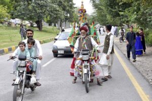 A large number of people participating in a rally to mark Eid-e-Milad-un-Nabi (PBUH) at G-7 sector in the federal capital
