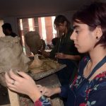 Fine Art students busy in sculpturing at National College of Arts (NCA)