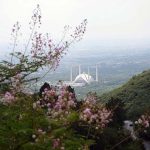 A beautiful view of Faisal Mosque Cover between mountains in the Federal Capital.