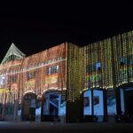 An illuminated view of Rescue 1122 building decorated with colorful lights in connection with Eid Milad-un-Nabi (PBUH) celebrations.