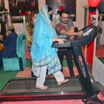 A woman walking on treadmill in Ladies GYM & fitness center at Latifabad.