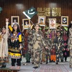 Students performing in tableau during ceremony on the occasion of Pakistan Defence Day at Islamabad Model College for Girls F-6/2.