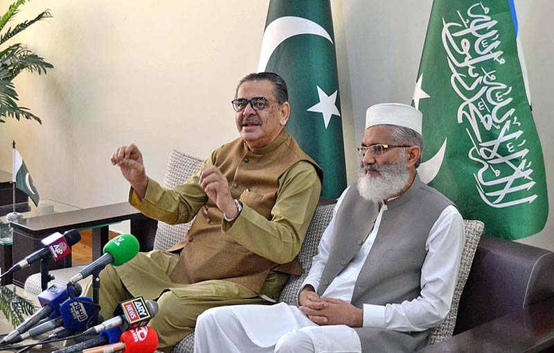 Caretaker Federal Minister for Religious Affairs and Interfaith Harmony Aneeq Ahmed along with Ameer Jamaat-e-Islami Sirajul Haque talking to media persons at Jamaat-e-Islami Center Mansoora.
