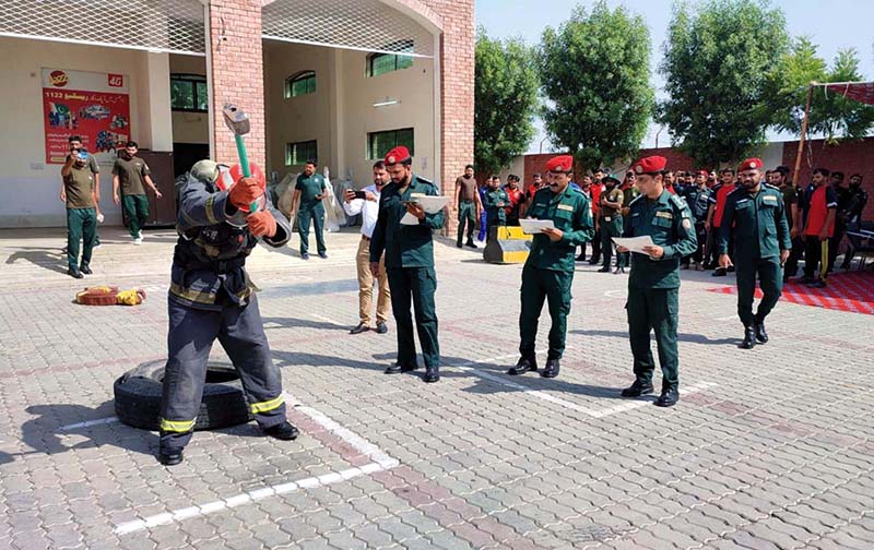 Rescue officials of different teams demonstrating their skills during 12th Inter District Rescue-1122 Challenge