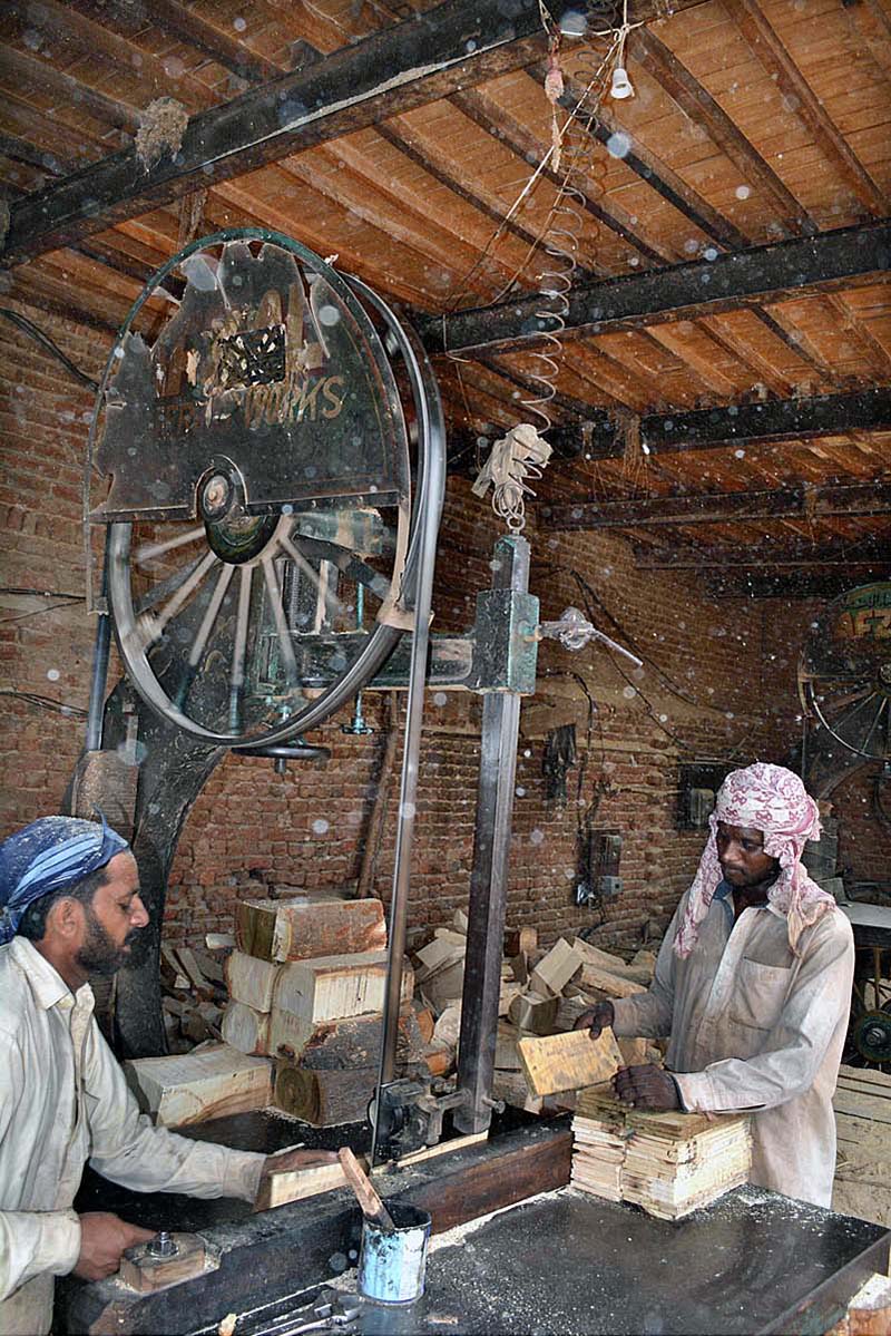 Labourar busy in work on their work place at wooden market