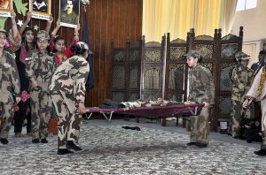Students performing in tableau during ceremony on the occasion of Pakistan Defence Day at Islamabad Model College for Girls F-6/2.
