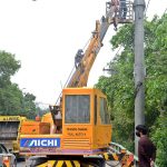 Staffers of safe city project are busy in maintenance work of CCTV camera at canal road.