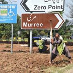 CDA gardener busy in preparing roadside greenbelt for planting flowers in Federal Capital