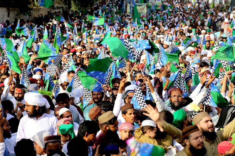 A large number of people participating in a religious procession on the occasion of Eid Milad-ul-Nabi (PBUH)