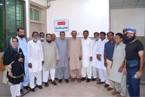 A group photo featuring MS DHQ Sargodha Nayyar Abbas and journalists as they set up a counter for the convenience of journalists