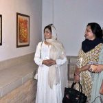 Female Visitors keenly viewing paintings during Pakistan National Council of the Arts is delighted to present a fantastic new calligraphy exhibition Titled “Mehar-e-Qalam” to celebrate the holy month of Rabi-ul-awal at PNCA.