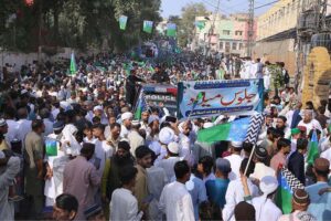 A large number of people participating in a religious procession on the occasion of Eid Milad-ul-Nabi (PBUH)