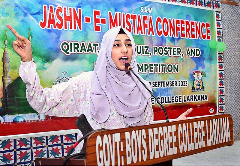 A students speaks during Qirat, Naat, Quiz, Poster and Essay Competition in Jashan Mustafa Conference organized on the occasion of Rabi-ul-Awwal at Government Boys Degree Collage.