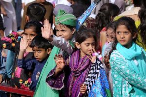 A large number of people participating in a religious procession on the occasion of Eid Milad-ul-Nabi (PBUH)