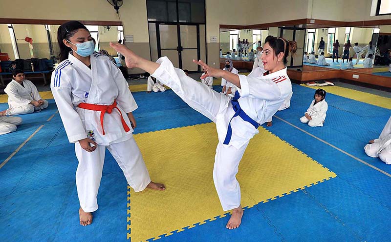 Karate players are in action during training class of judo karate at Qayyum Sports Complex
