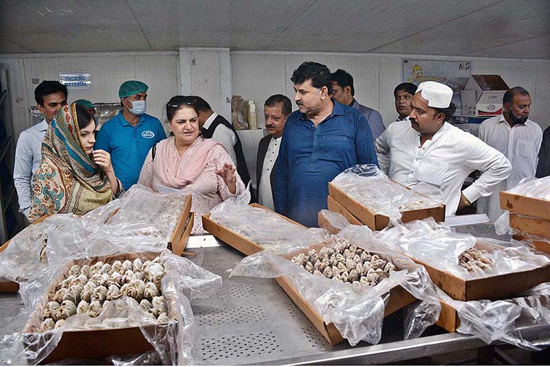 Chairperson Senate Standing Committee on Maritime Affairs Senator Rubina Khalid inspecting a seafood processing unit at Korangi Fisheries Harbour Authority (KoFHA)