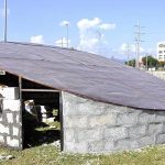 Mason busy in constructing a big size clock along roadside at 9th avenue in the Federal Capital.
