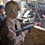 Security high alert on the top of building at Koh-e-Noor Chowk during Chehlam of Hazrat Imam Hussain (RA) the grandson of the Holy Prophet Mohammad (PBUH), martyred along with his family members and companions at Karbala.