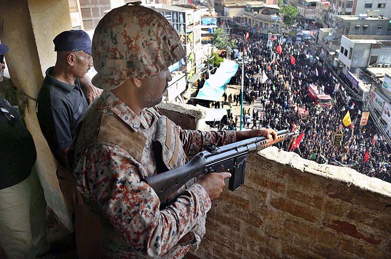 Security high alert on the top of building at Koh-e-Noor Chowk during Chehlam of Hazrat Imam Hussain (RA) the grandson of the Holy Prophet Mohammad (PBUH), martyred along with his family members and companions at Karbala.