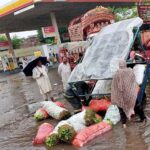 A loader rickshaw Turn Turtle due to overloaded during passing through the accumulated water near sabzi mandi after heavy rain that experienced in the Provincial Capital.