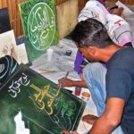 Students are practicing calligraphy in a Two-Day Calligraphy Workshop organized by Bab Pakistan Foundation