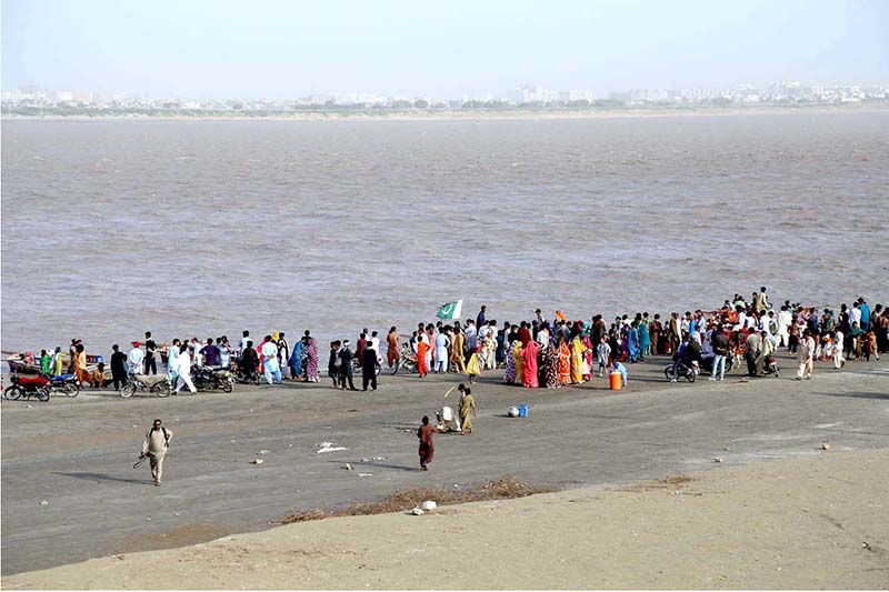 A large number of Hindu community members are joyfully celebrating the Ramakrishna festival on the banks of the Indus River