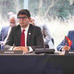 Dr. Muhammad Ali, Deputy Secretary Prime Minister's Youth Program, unveils the draft ministerial statement at the 10th Commonwealth Youth Ministers Meeting. It underlines core values, tech, education, youth engagement, employment, policy, and partnerships, turning "aiming higher" into actionable steps