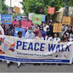 Hyderabad Citizen’s Forum members and students participating in a Peace Walk outside press club to mark International Peace Day.