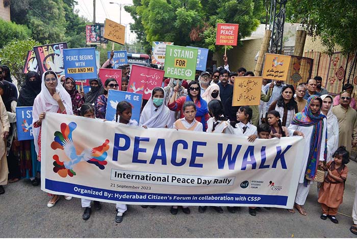 Hyderabad Citizen’s Forum members and students participating in a Peace Walk outside press club to mark International Peace Day.