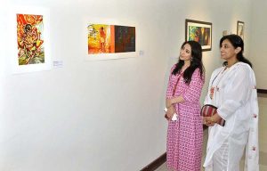  Visitors keenly viewing stuff during the inaugurating ceremony of the Two Person Exhibition titled "HAQ" organized by PNCA & Nomad Gallery at PNCA. 