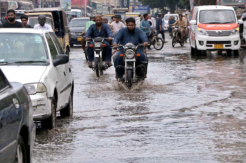 Vehicular traffic face problem in movement due to stagnant water on the road at Saddar area after rain in the Provincial Capital